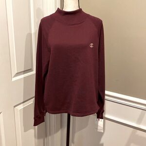 NWT Plum/cranberry colored seize Medium Champion mock neck sweatshirt.